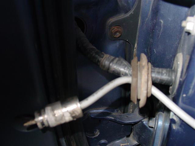 Door jam grommet